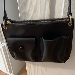 Anthropology black leather purse.